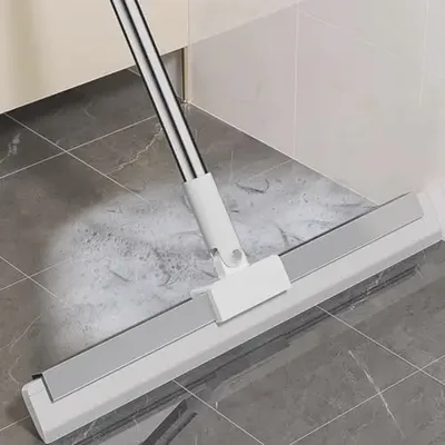 ممسحة سيليكون تكنس الشعر وتسحب الماء بحركة وحدة