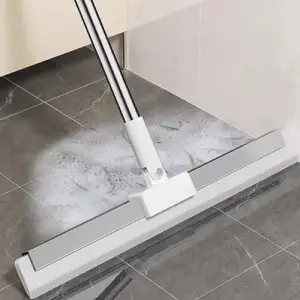 ممسحة سيليكون تكنس الشعر وتسحب الماء بحركة وحدة